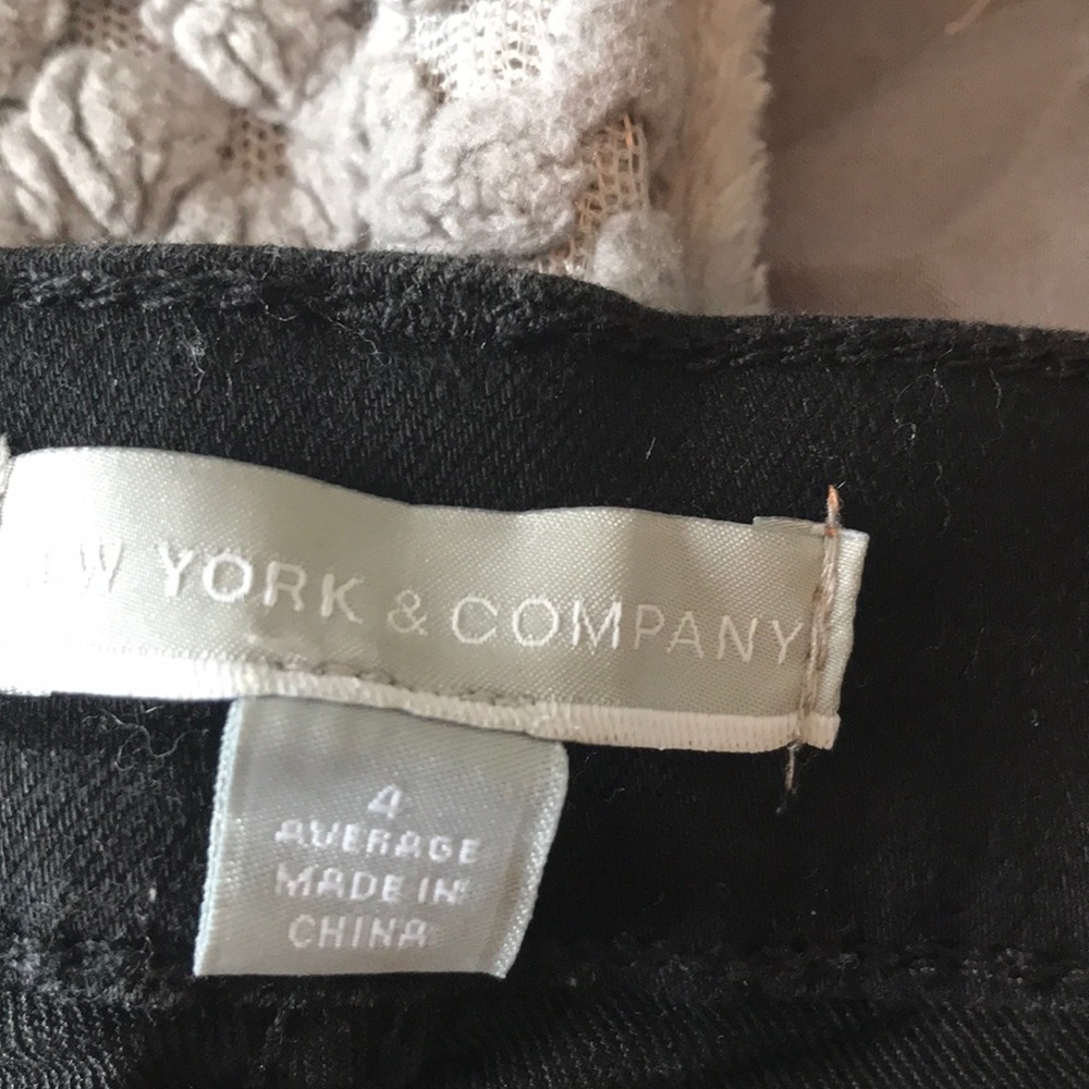 Boot cut, stretchy, black , 5 pocket, size 4.